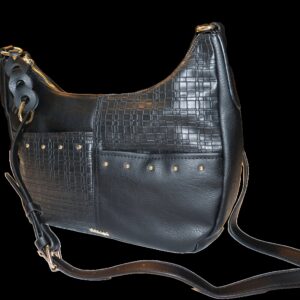 Black leather handbag featuring textured panels and studded accents