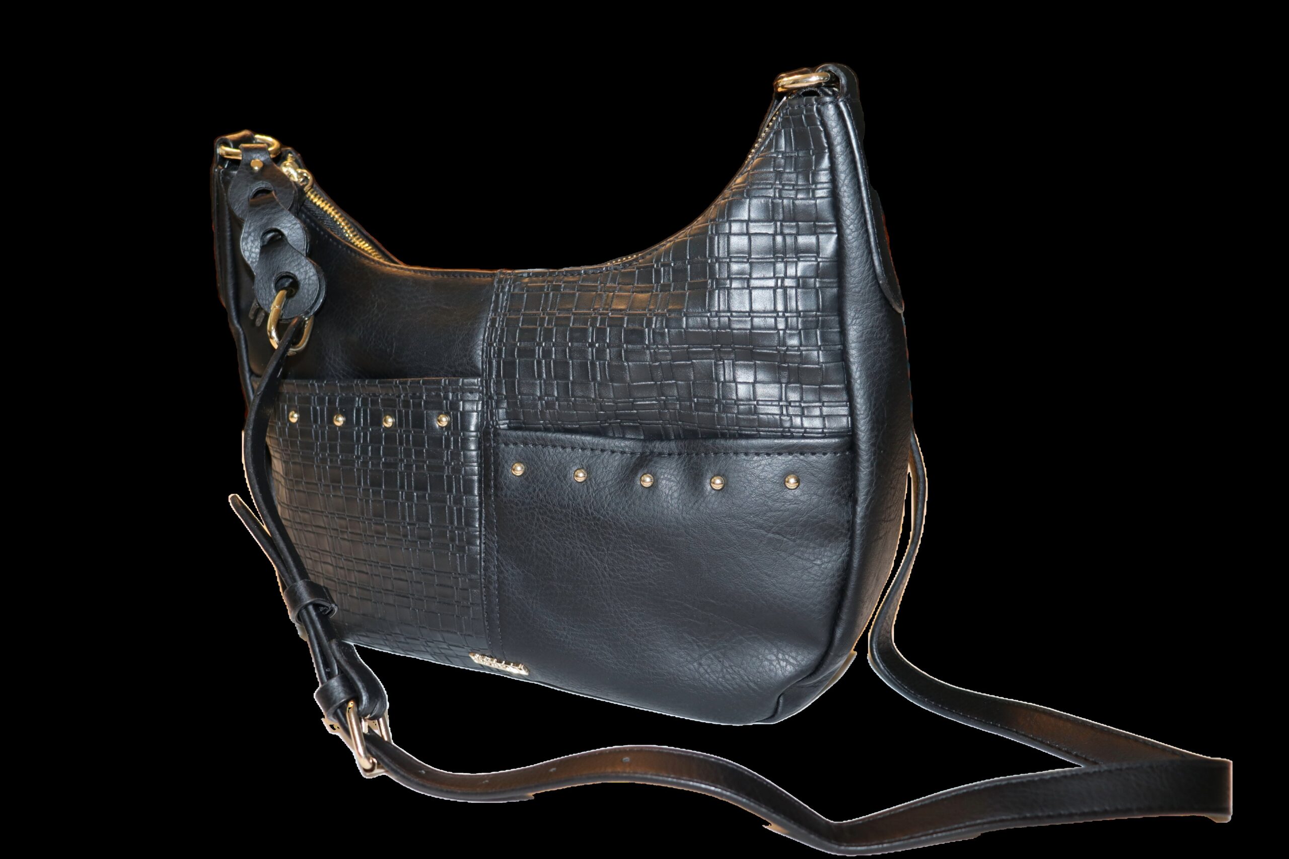 Black leather handbag featuring textured panels and studded accents